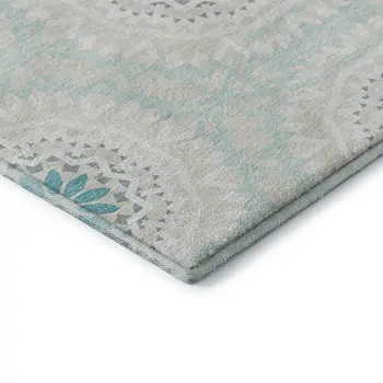 10' X 14' Teal And Ivory Geometric Washable Area Rug With UV Protection