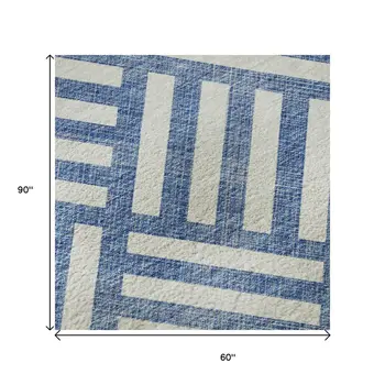 5' X 8' Blue And Ivory Geometric Washable Area Rug With UV Protection