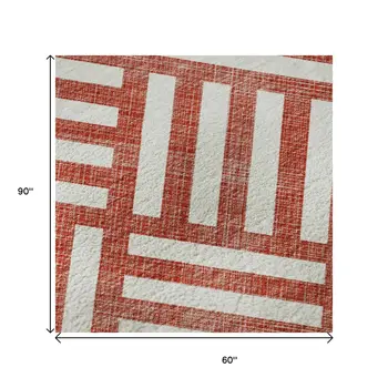 5' X 8' Red And Ivory Geometric Washable Area Rug With UV Protection