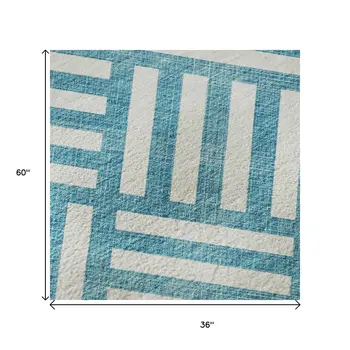 3' X 5' Teal And Ivory Geometric Washable Area Rug With UV Protection