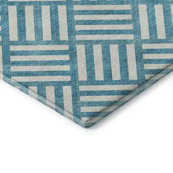 10' X 14' Teal And Ivory Geometric Washable Area Rug With UV Protection