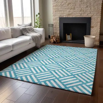10' X 14' Teal And Ivory Geometric Washable Area Rug With UV Protection