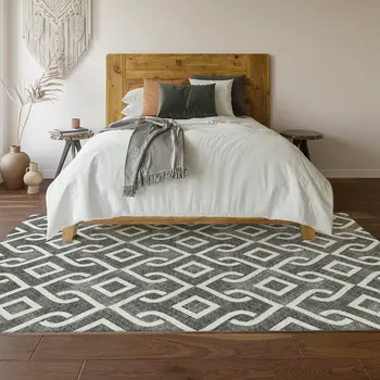 10' X 14' Black And Ivory Geometric Washable Area Rug With UV Protection
