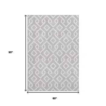 5' X 8' Lavender And Ivory Geometric Washable Area Rug With UV Protection