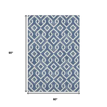 5' X 8' Navy Blue And Ivory Geometric Washable Area Rug With UV Protection
