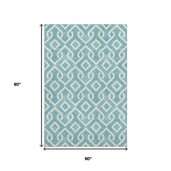 5' X 8' Teal And Ivory Geometric Washable Area Rug With UV Protection