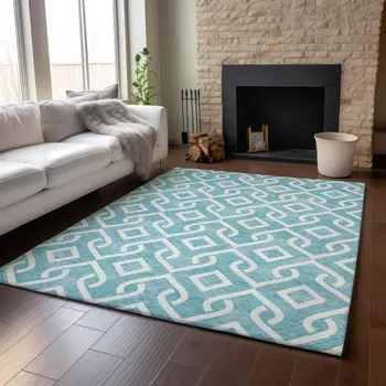 9' X 12' Teal And Ivory Geometric Washable Area Rug With UV Protection