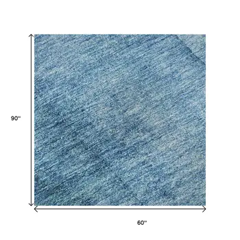 5' X 8' Teal And Ivory Ombre Washable Area Rug With UV Protection