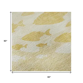 5' X 8' Gold And Ivory Nautical Washable Area Rug With UV Protection