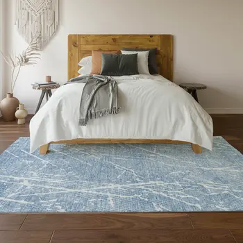 5' X 8' Blue And Ivory Abstract Washable Area Rug With UV Protection