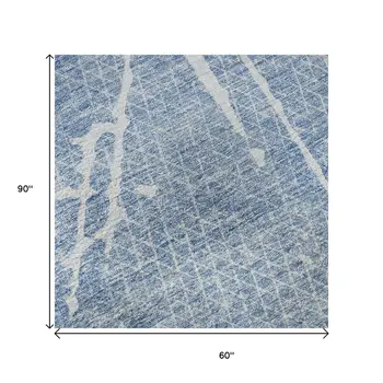 5' X 8' Blue And Ivory Abstract Washable Area Rug With UV Protection