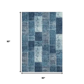 5' X 8' Blue And Ivory Patchwork Washable Area Rug With UV Protection