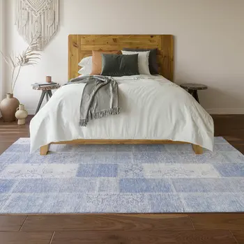 8' X 10' Sky Blue And Ivory Patchwork Washable Area Rug With UV Protection