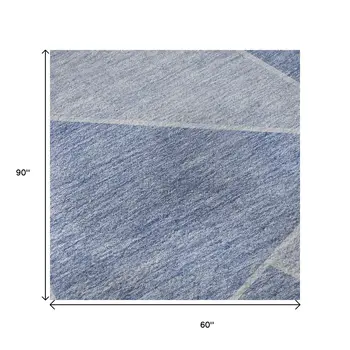 5' X 8' Sky Blue And Ivory Geometric Washable Area Rug With UV Protection