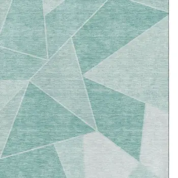 8' X 10' Teal And Ivory Geometric Washable Area Rug With UV Protection