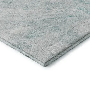 5' X 8' Teal And Ivory Abstract Washable Area Rug With UV Protection