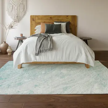 5' X 8' Teal And Ivory Abstract Washable Area Rug With UV Protection