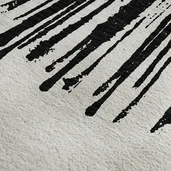 3' X 5' Black And Ivory Abstract Washable Area Rug With UV Protection