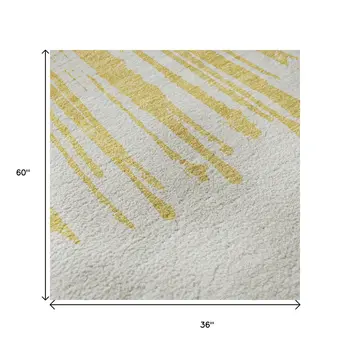 3' X 5' Gold And Ivory Abstract Washable Area Rug With UV Protection