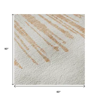 5' X 8' Salmon And Ivory Abstract Washable Area Rug With UV Protection