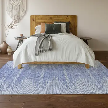 5' X 8' Denim Blue And Ivory Abstract Washable Area Rug With UV Protection