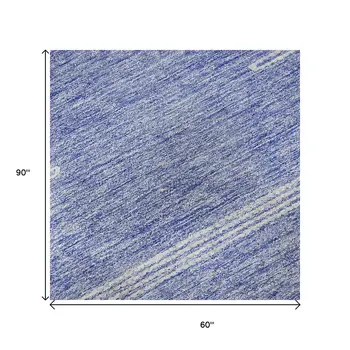 5' X 8' Denim Blue And Ivory Abstract Washable Area Rug With UV Protection