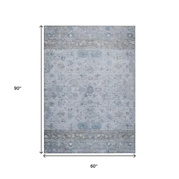 5' X 8' Sky Blue Gray And Ivory Tribal Washable Indoor Outdoor Area Rug