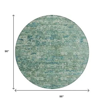 8' Teal Blue And Ivory Round Ikat Washable Indoor Outdoor Area Rug