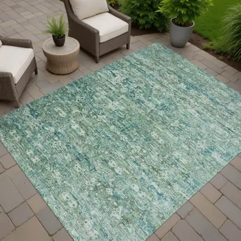 10' X 14' Teal Blue And Ivory Ikat Washable Indoor Outdoor Area Rug