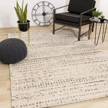 5' X 8' Cream And Brown Tribal Area Rug