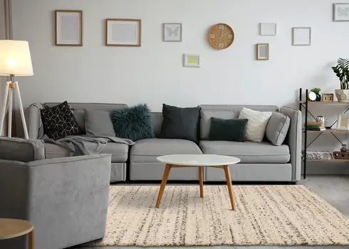 5' X 8' Cream And Brown Tribal Area Rug