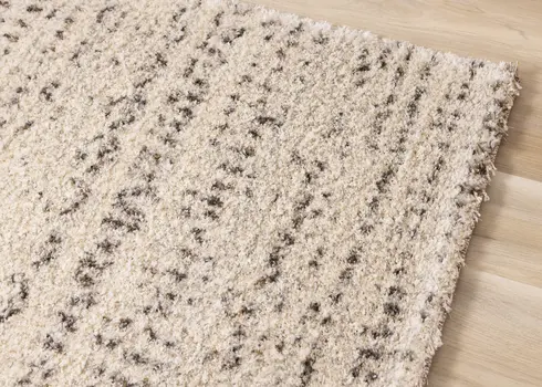 5' X 8' Cream And Brown Tribal Area Rug