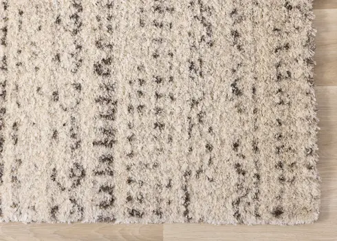 5' X 8' Cream And Brown Tribal Area Rug