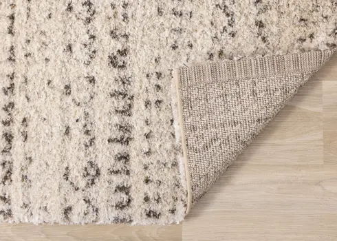 5' X 8' Cream And Brown Tribal Area Rug