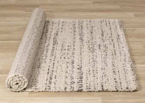 5' X 8' Cream And Brown Tribal Area Rug
