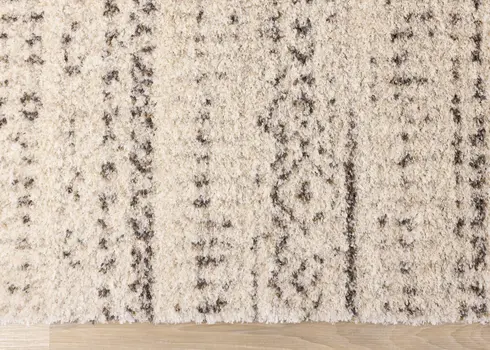 5' X 8' Cream And Brown Tribal Area Rug