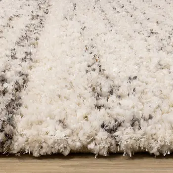 5' X 8' Cream And Brown Tribal Area Rug