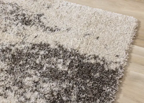 8' X 11' Cream And Brown Area Rug