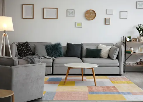5' X 8' Yellow And Orange Geometric Area Rug