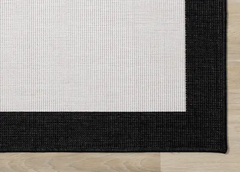7' X 10' Black And Cream Area Rug