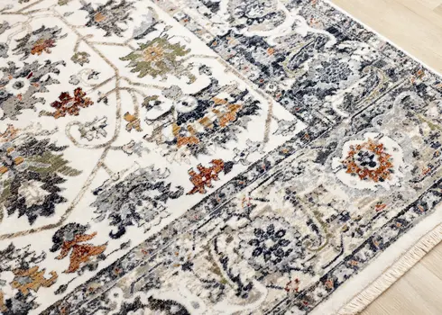 7' X 10' Cream And Blue Abstract Area Rug