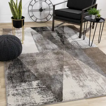 5' X 8' Cream And Brown Geometric Area Rug