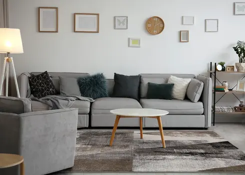 5' X 8' Cream And Brown Geometric Area Rug