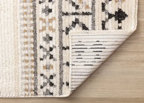 5' X 8' Cream And Black Tribal Area Rug