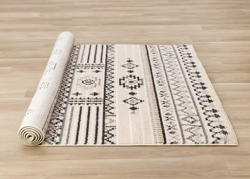 5' X 8' Cream And Black Tribal Area Rug