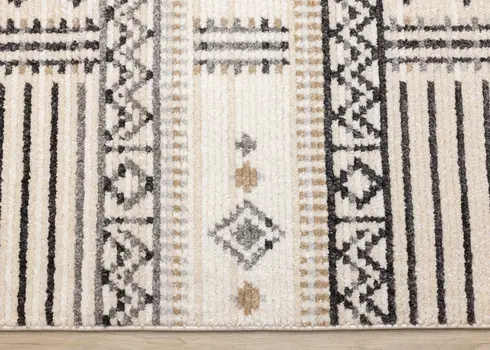 5' X 8' Cream And Black Tribal Area Rug