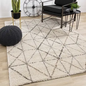 5' X 8' Cream And Gray Tribal Area Rug