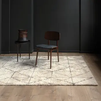 5' X 8' Cream And Gray Tribal Area Rug