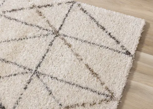 5' X 8' Cream And Gray Tribal Area Rug