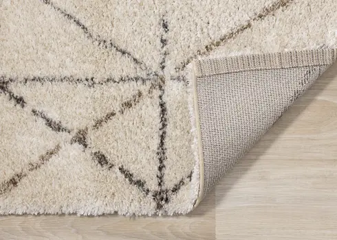 5' X 8' Cream And Gray Tribal Area Rug
